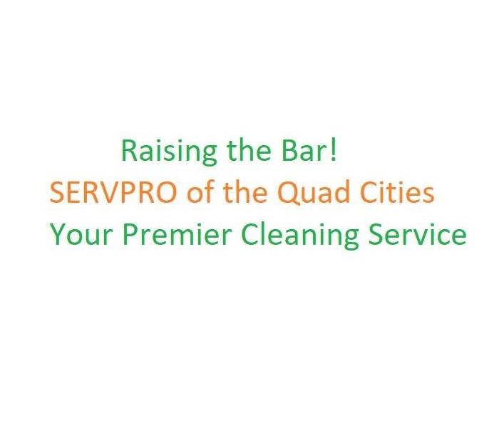 Green and orange wording, Raising the Bar, SERVPRO of the Quad Cities