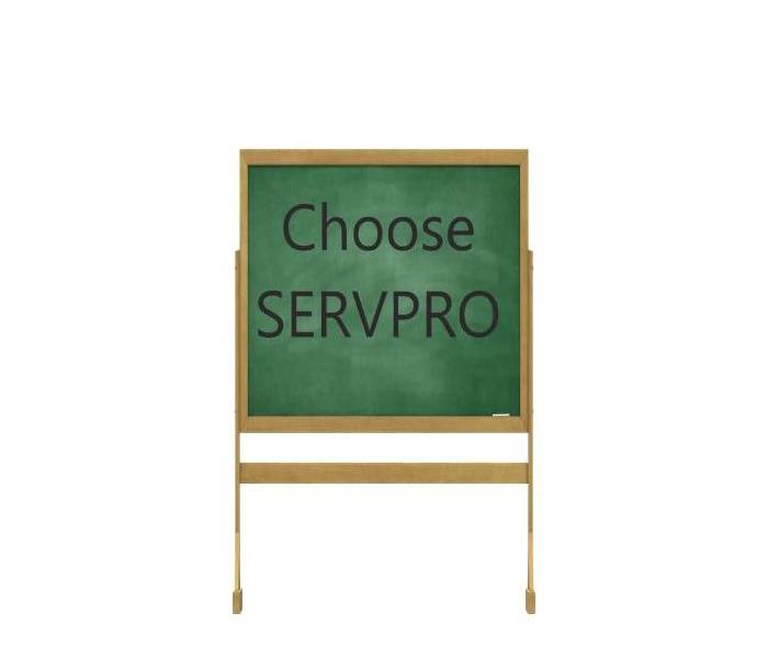 Chalk board, wording Choose SERVPRO