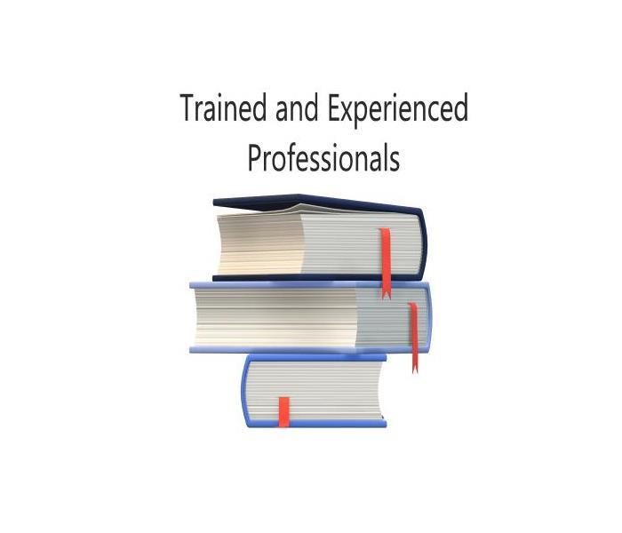 books stacked, wording Trained Experienced Professionals
